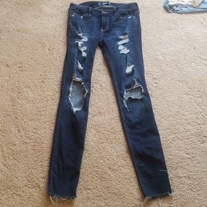 Like new.  Hollister destroyed super skinny jeans